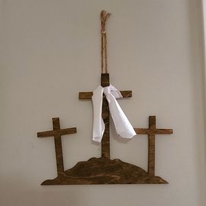 3 wooden crosses hanger